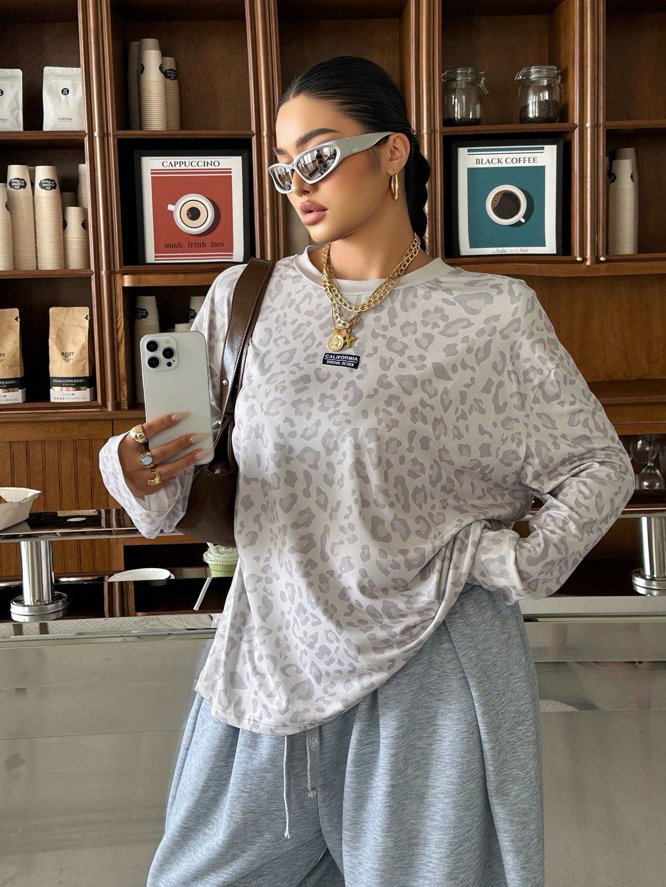 Muchica Plus Size Women's Leopard Print Crew Neck Drop Shoulder Long Sleeve Loose Casual T-Shirt Fall