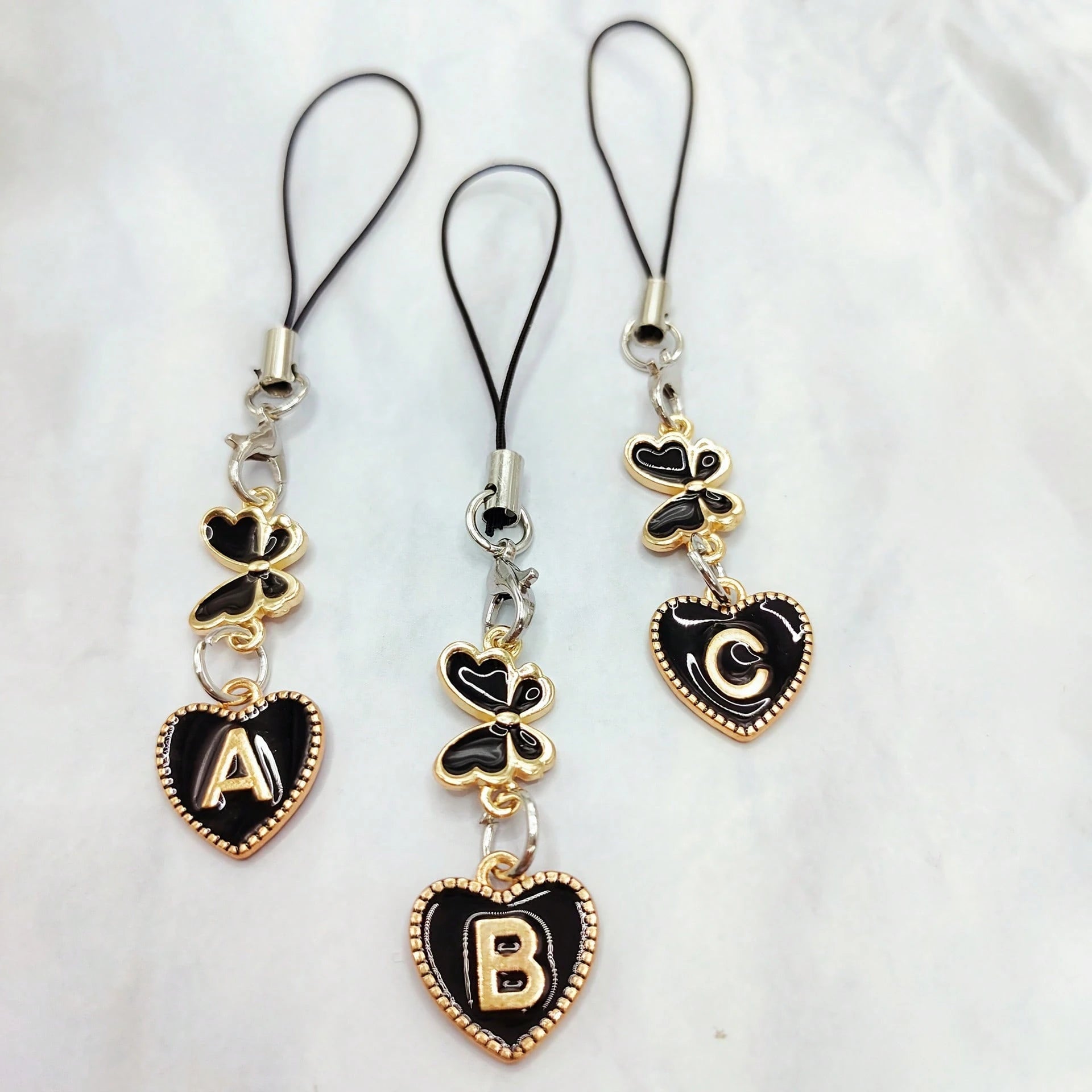1pc Black Letter A-Z & Exquisite Butterfly Design Phone Charm- Durable Alloy Material, Suitable For Friends, Best Friends And Birthday Gifts, Applicable To Phones, Phone Charms, Best Friend Gifts, El