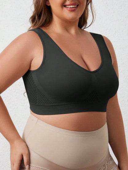 1pc Women Plus Size Seamless Hollow Design Yoga Sports Bra, Comfortable Breathable Fitted Supportive Activewear Top Black Spring