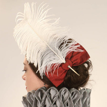 Includes matching 6” red taffeta hair bow - feather plume available separately