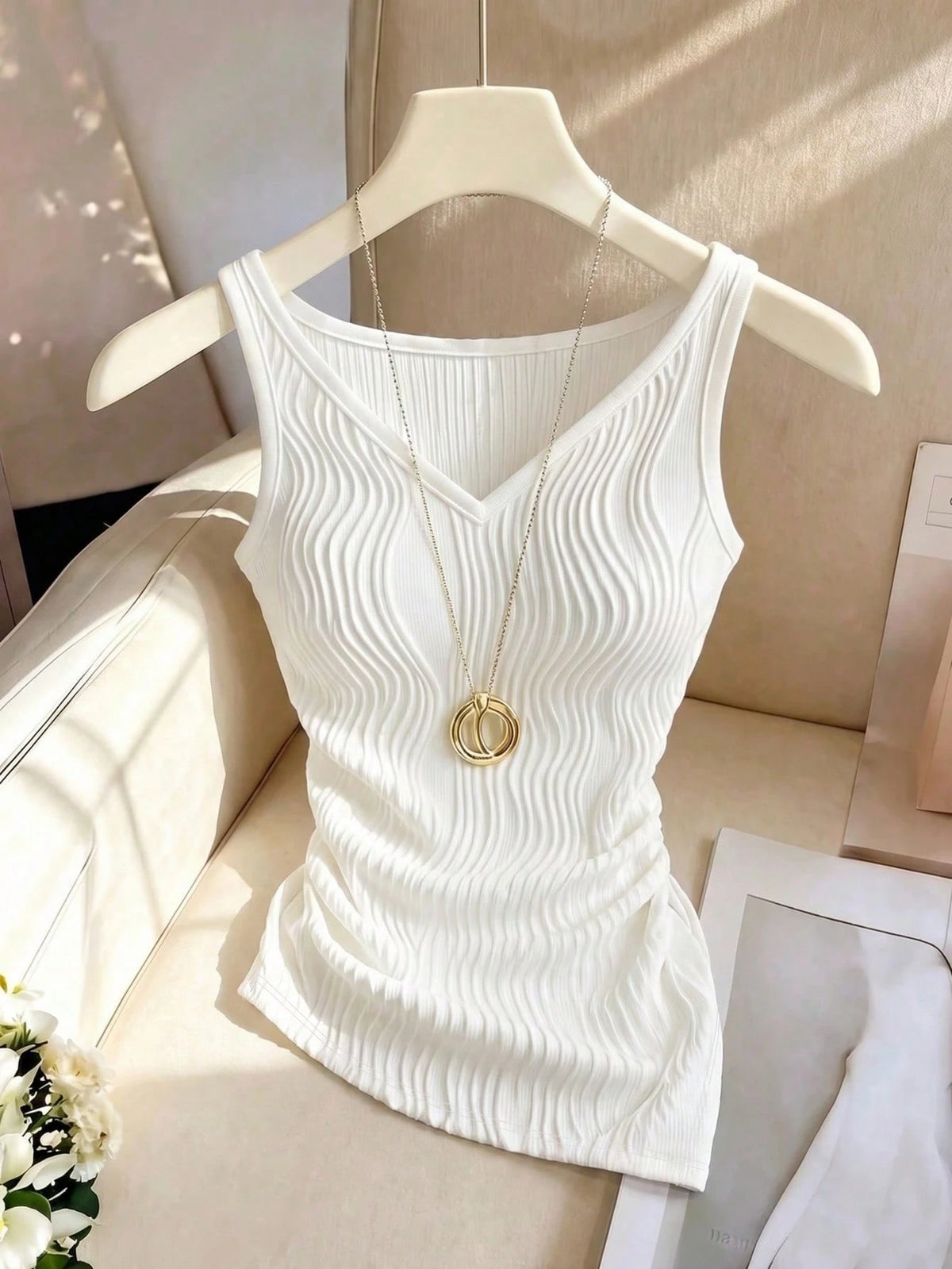 Franclia Women's White Sleeveless V-Neck Tank Top,Chic Elegant Summer Everyday Knit Fabric,Asymmetrical Wavy Hem,Elastic Sides,Fitted Versatile All-Match