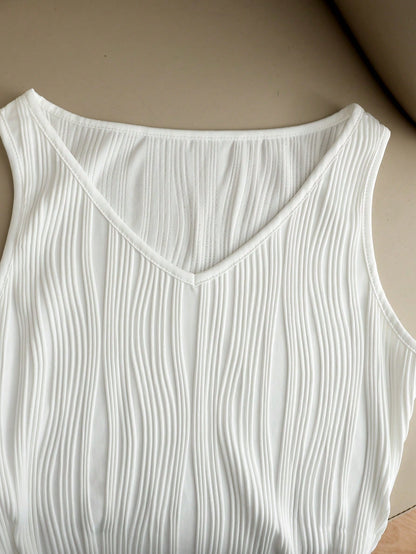 Franclia Women's White Sleeveless V-Neck Tank Top,Chic Elegant Summer Everyday Knit Fabric,Asymmetrical Wavy Hem,Elastic Sides,Fitted Versatile All-Match