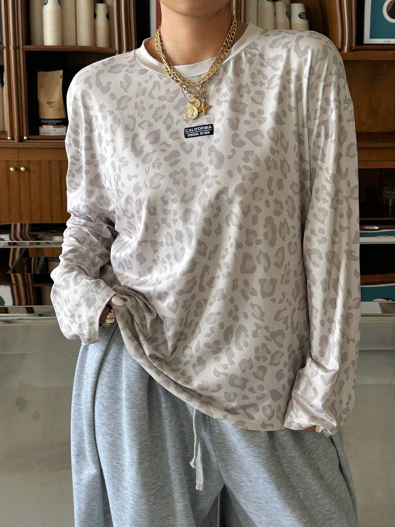 Muchica Plus Size Women's Leopard Print Crew Neck Drop Shoulder Long Sleeve Loose Casual T-Shirt Fall