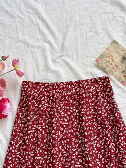 Soleia Women's Boho Burgundy Random Print Woven Fabric Midi Skirt With Slit And Zipper Detail Flower Print Skirt Long Floral Skirt